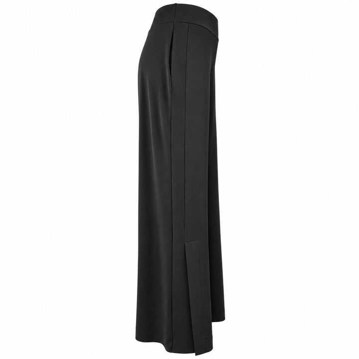 The Liberty black matte jersey pants, side view showing the wide waistband and full-length side panel.