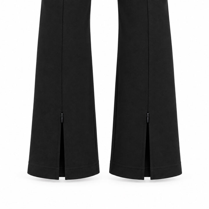 The Essex black ponte pants — rear ankle zipper and hem detail