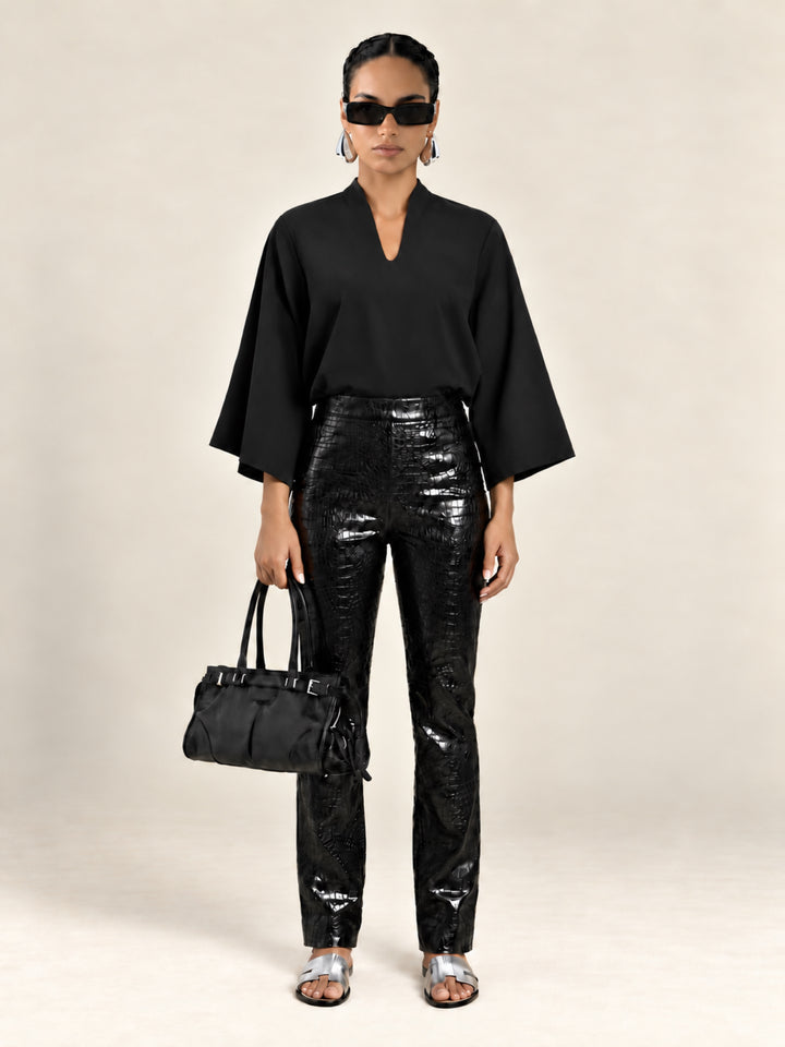 Black Waverly flutter-sleeve top with Bleeker croc pants, full-length front view