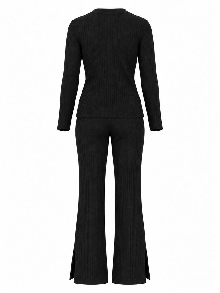 Back view of black Walker cashmere-blend rib-knit pants styled with the Trinity cardigan