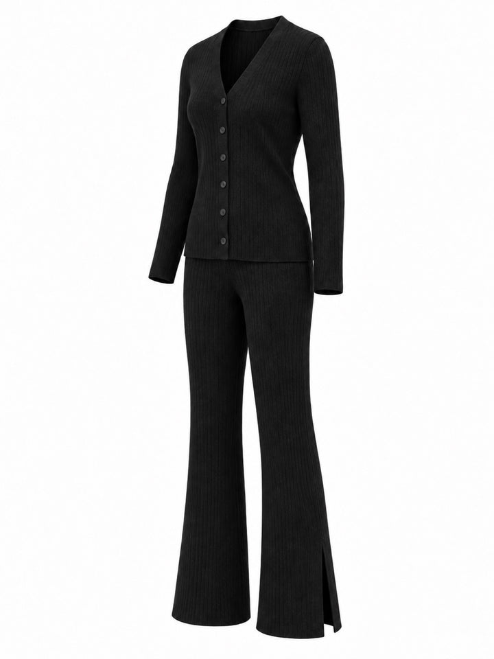 Three-quarter view of black Walker cashmere-blend rib-knit pants styled with the Trinity cardigan